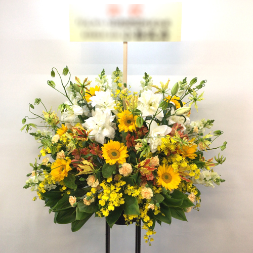 黄色・オレンジの色調のスタンド花