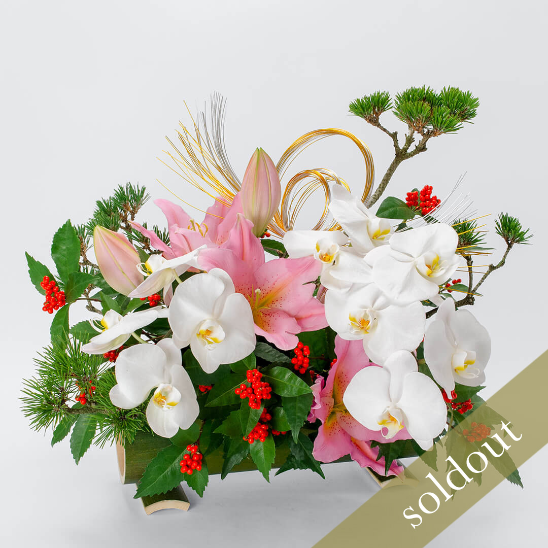 白の大輪胡蝶蘭やピンクのユリのアレンジメント