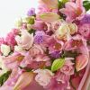 ユリと大輪バラのピンクの色調の花束