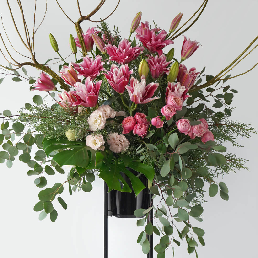 スタンド花 1段（ピンク系・花材おまかせの祝い花）【ご予算・スタンド