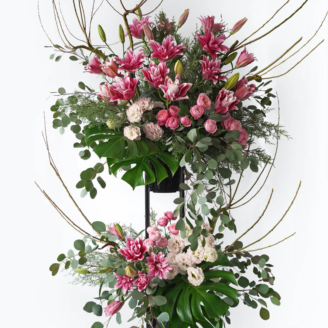 スタンド花 2段（ピンク系・花材おまかせの祝い花）【ご予算指定可