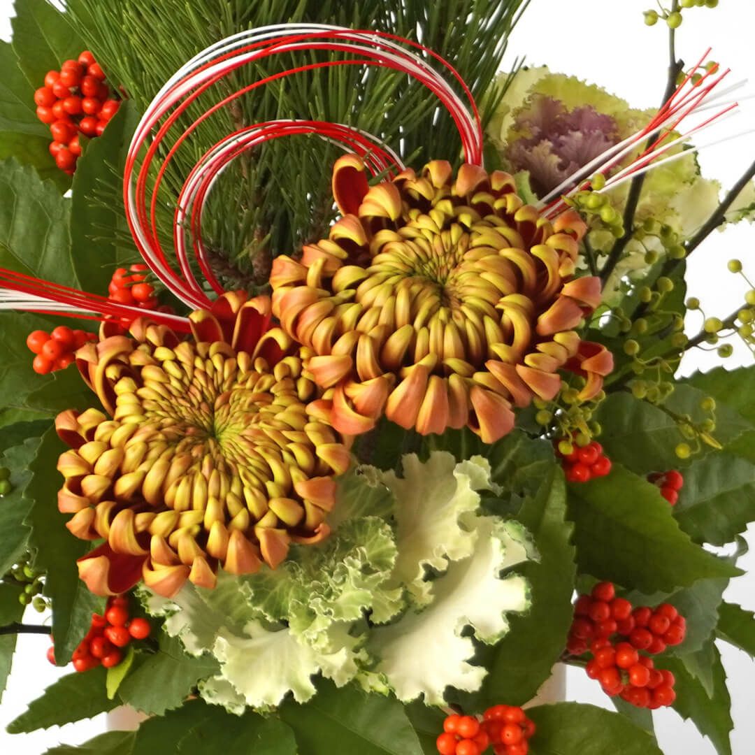 【お正月・お年賀】オレンジの複色のマムのアレンジメント